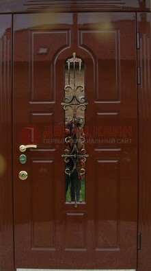 Красивая металлическая дверь со стеклом и ковкой ДСК-33 в Апрелевке