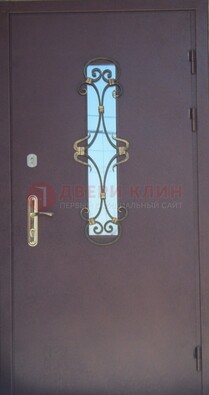Металлическая дверь со стеклом и ковкой ДСК-77 в Апрелевке
